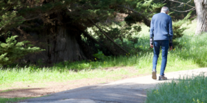Christopher Noel Ryan walking away along a path